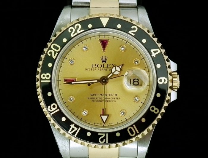 A steel & gold serti dial Rolex GMT Master II ref 16713