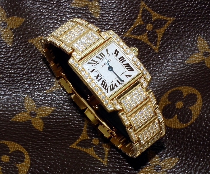cartier diamond studded watch