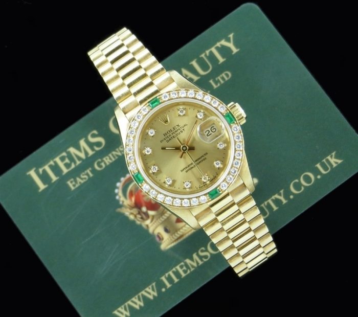 Factory diamond & emerald 18ct Rolex Datejust