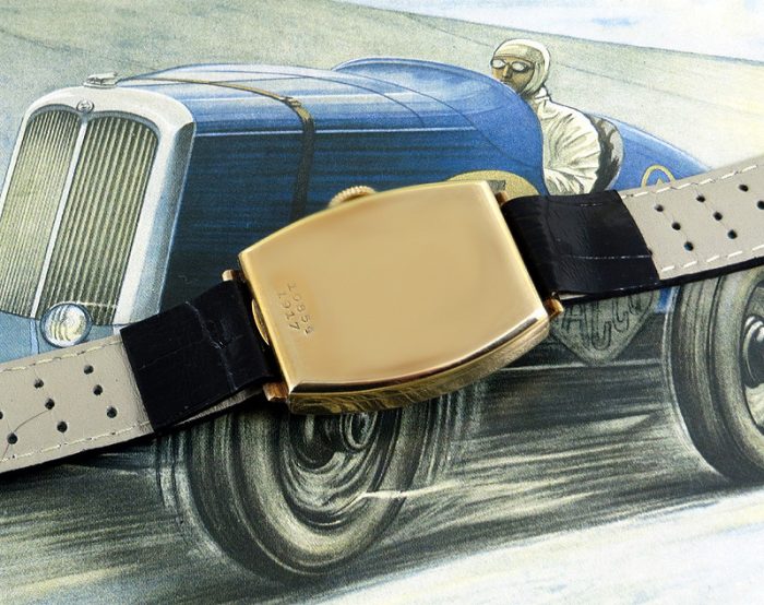 A mint 1934 9ct gold vintage tonneau shaped Rolex