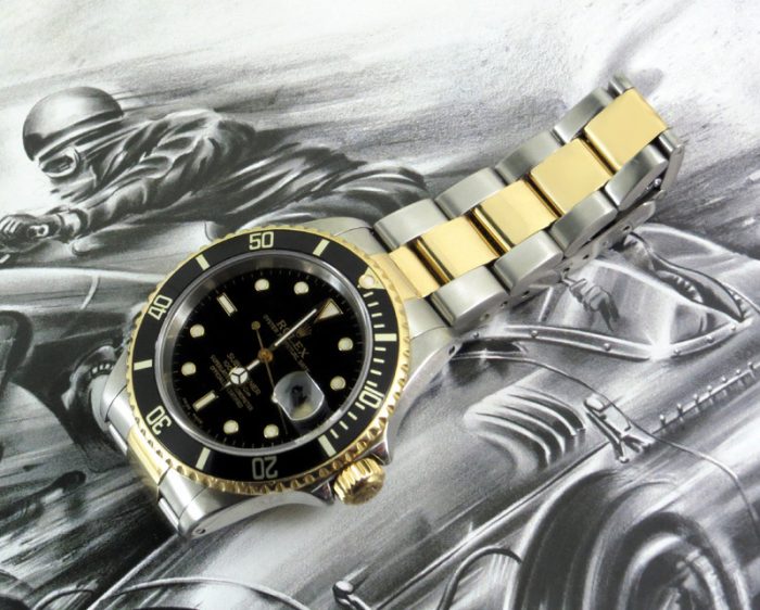 Steel & gold black kit Rolex Submariner with paper