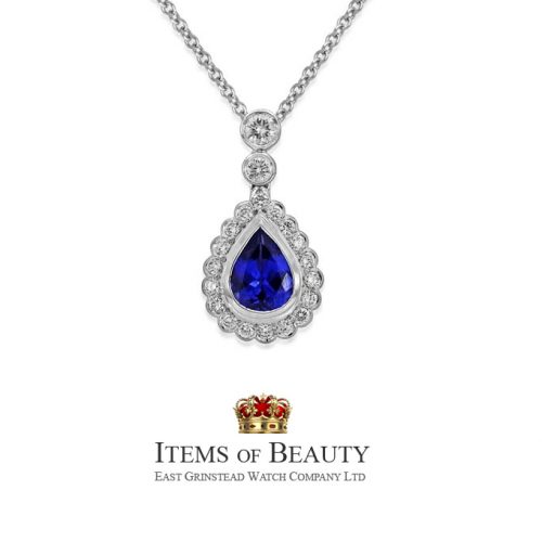18ct gold diamond & tanzanite pendant with chain